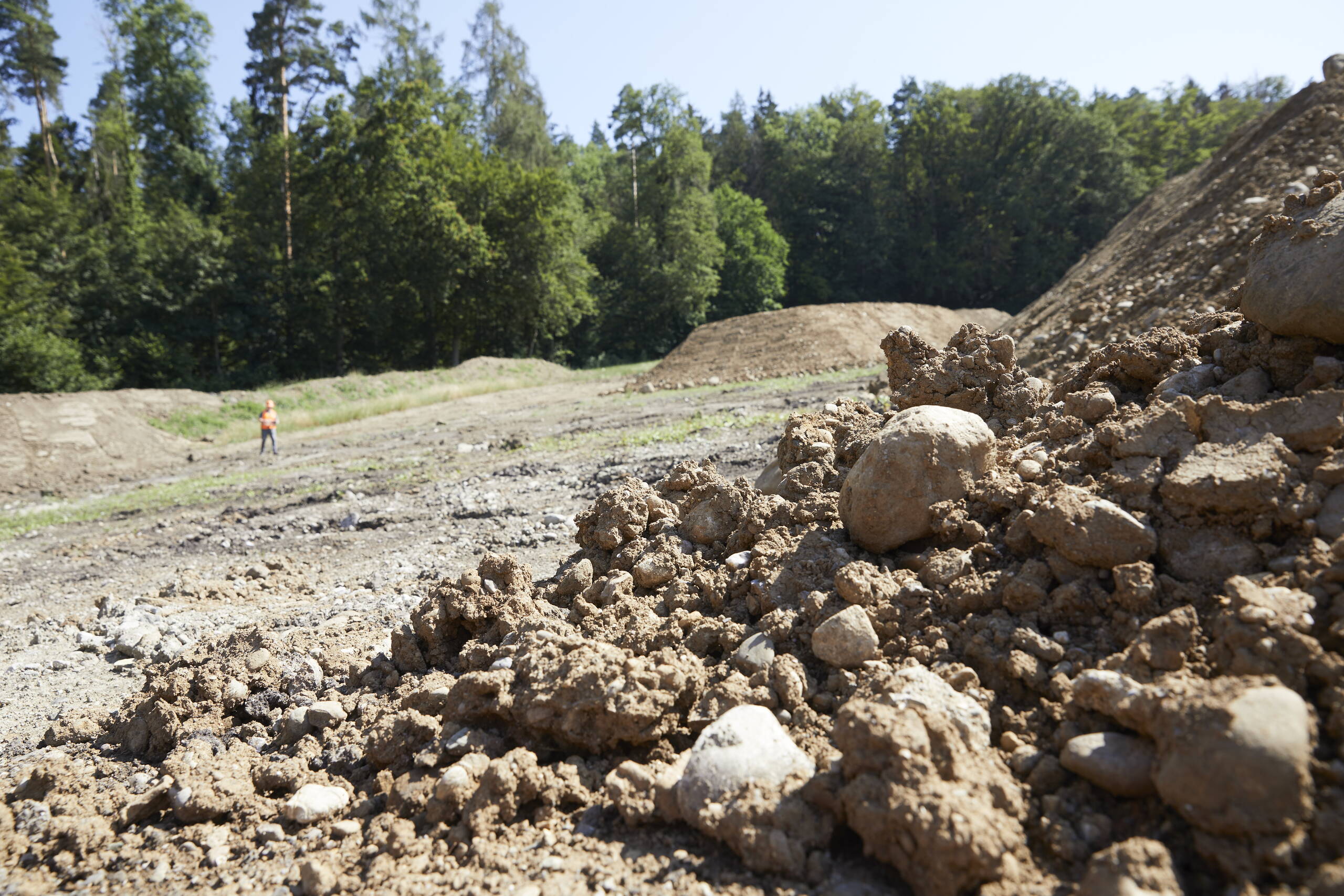 Inspection of the depths of topsoil and subsoil removed. Inspection of the depths of topsoil and subsoil removed.