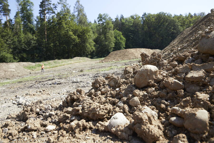 Inspection of the depths of topsoil and subsoil removed.